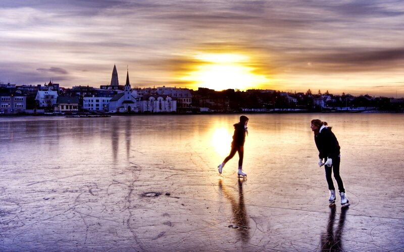 Two People Ice Skating — Yellow