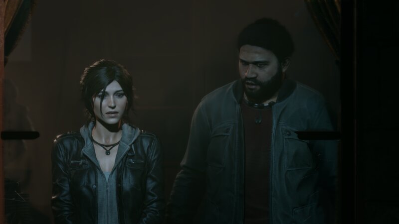 Two People in a Dim Room