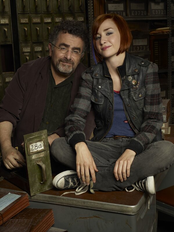 Two people in a filing room