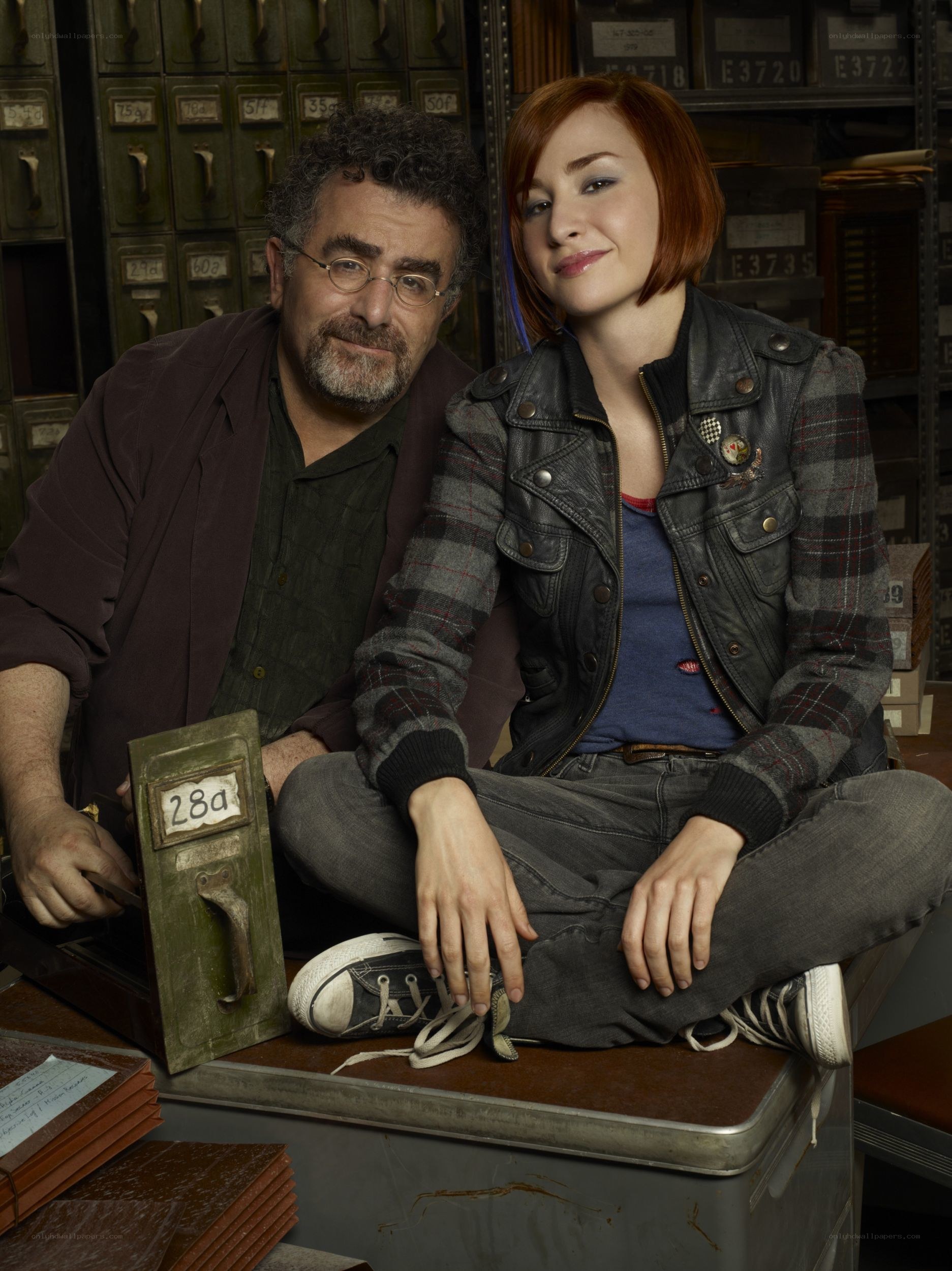 Two people in a filing room