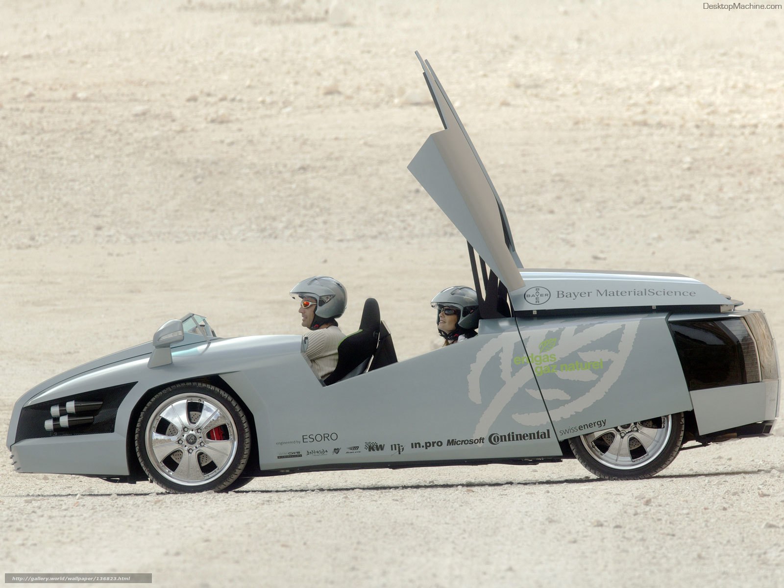 Two people in a futuristic car