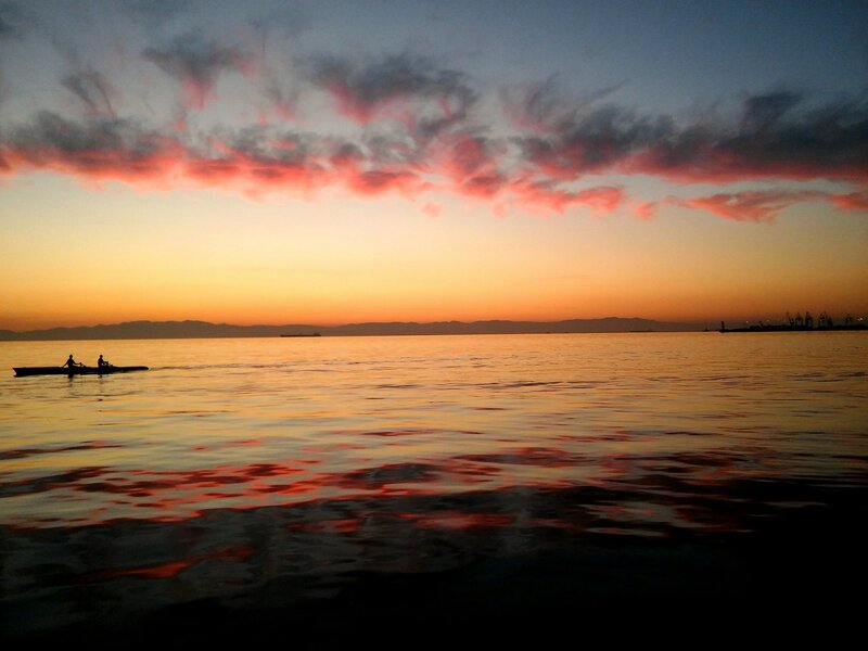 Two People in a Kayak — Orange