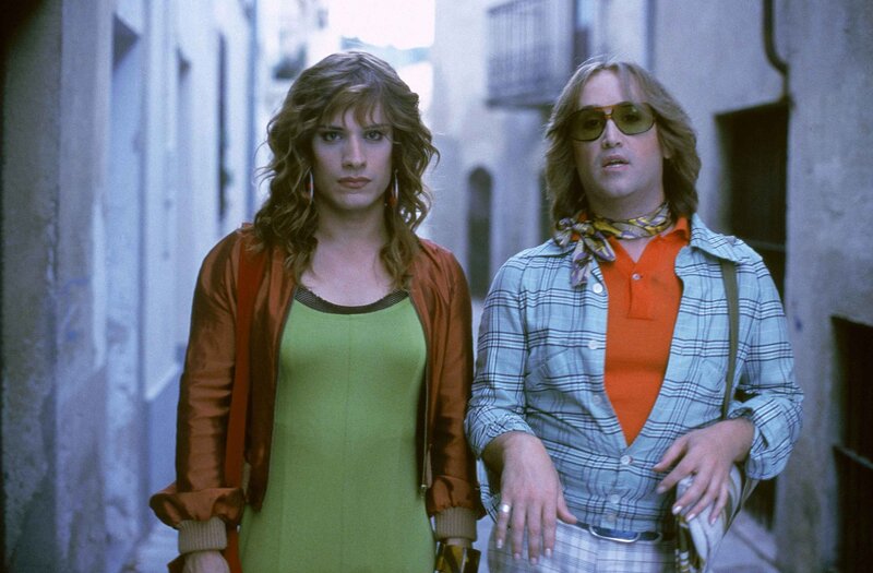 Two people in a narrow alley