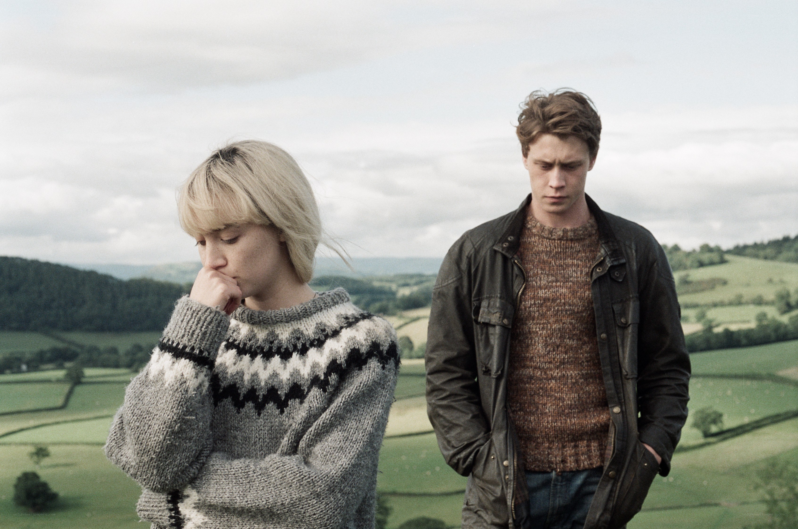 Two people in a rural landscape