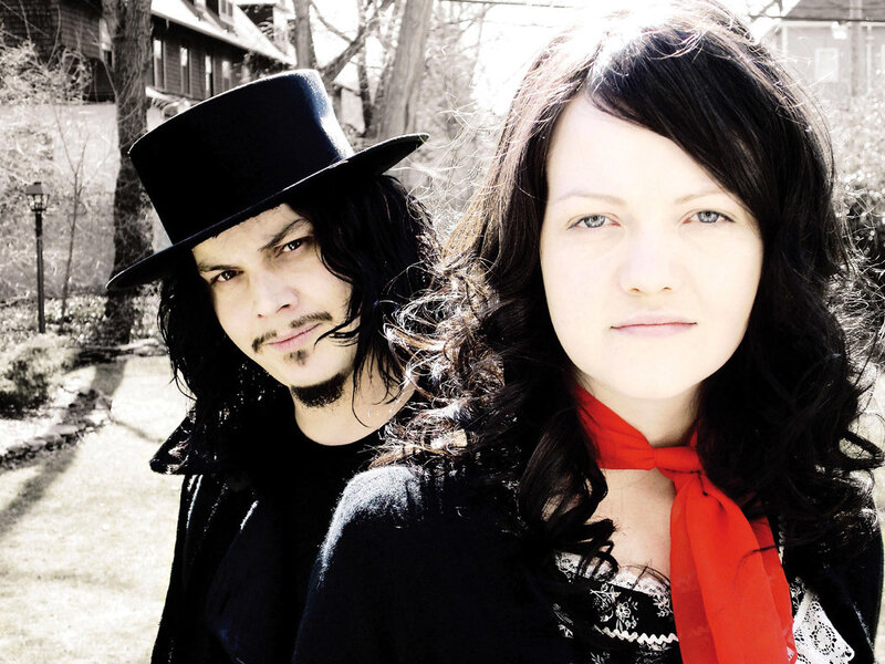 two people in black and red