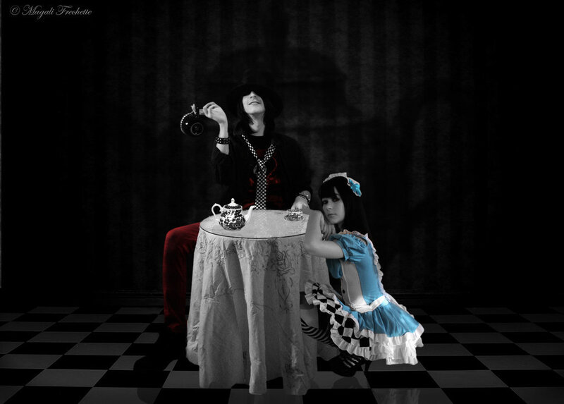 Two People in Costumes — Black, Dramatic