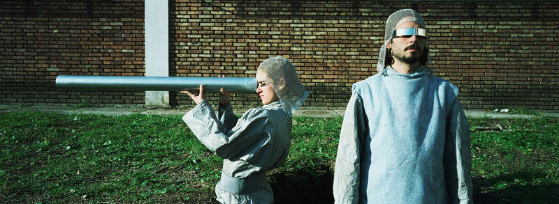 Two people in futuristic attire