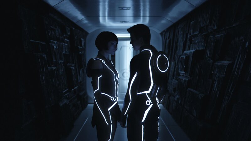 Two People in Glowing Suits