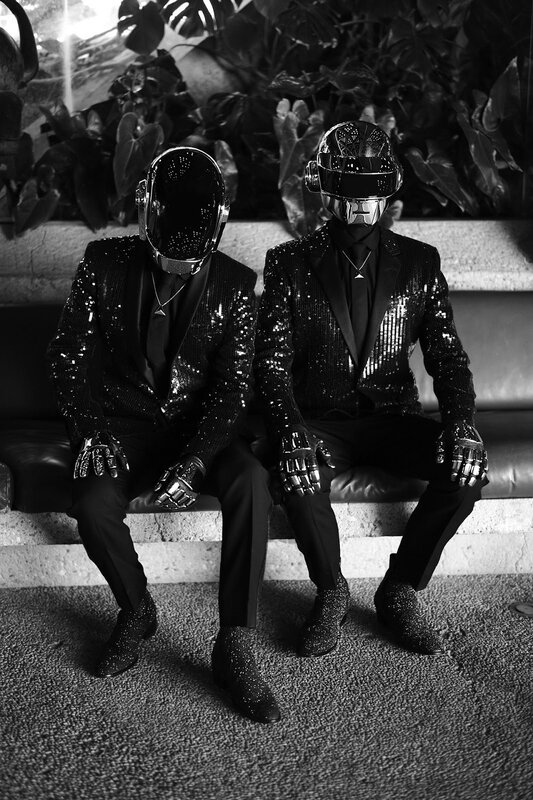 Two People in Helmets — Black, Dramatic, Photograph, Sequin Suits