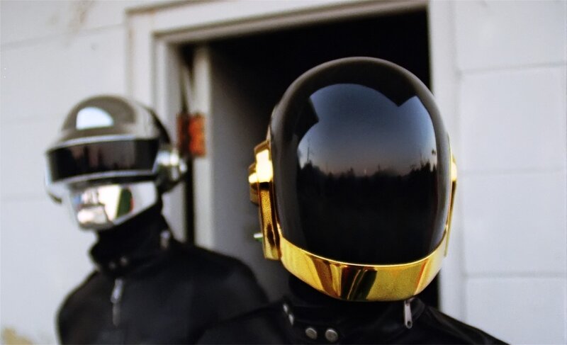 Two People in Helmets — Black, Dramatic