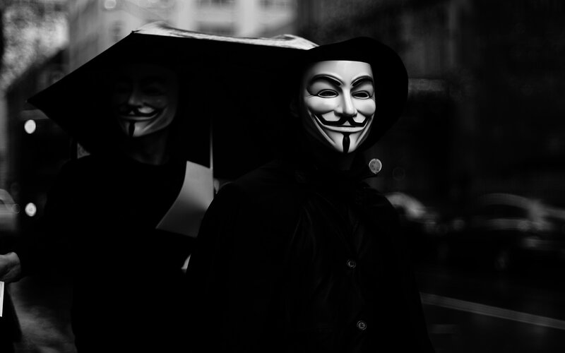 Two People in Masks — Black, Dramatic, Night, Photograph