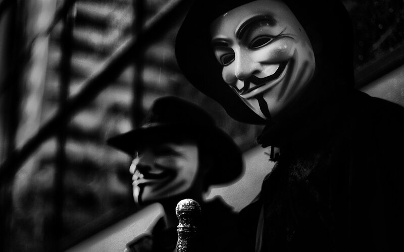 Two People in Masks — Black, Dramatic, Photograph, Hats