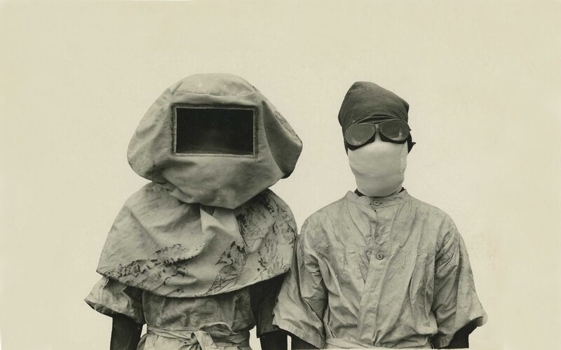 Two People in Protective Gear