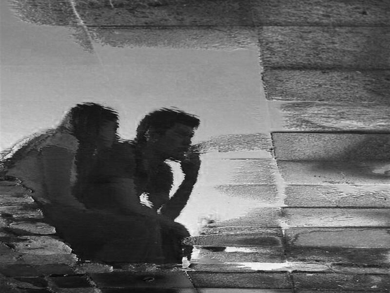 Two People in Puddle