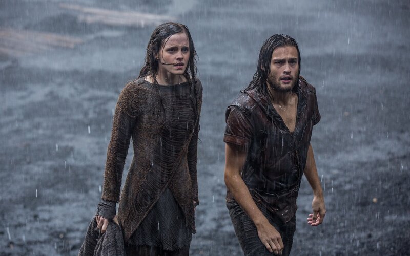 Two people in rainstorm
