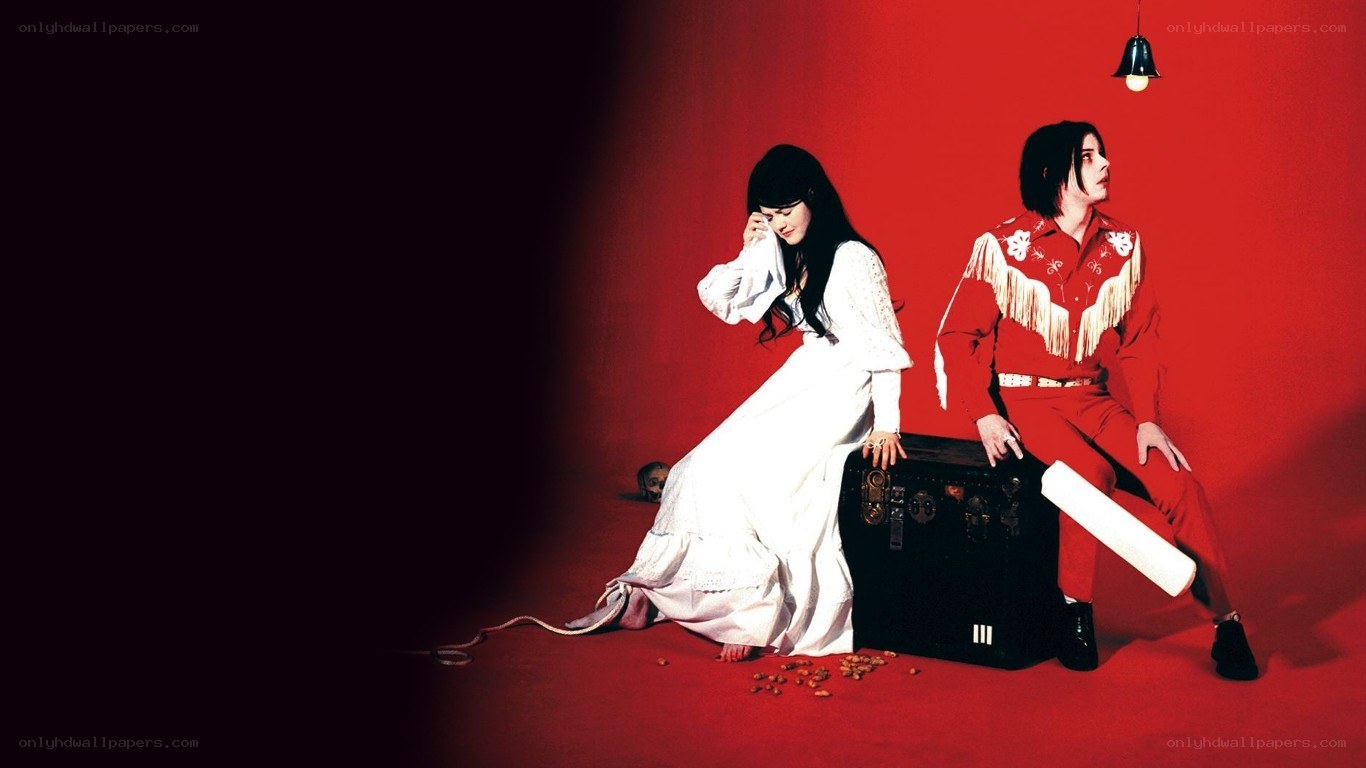 Two people in red and white