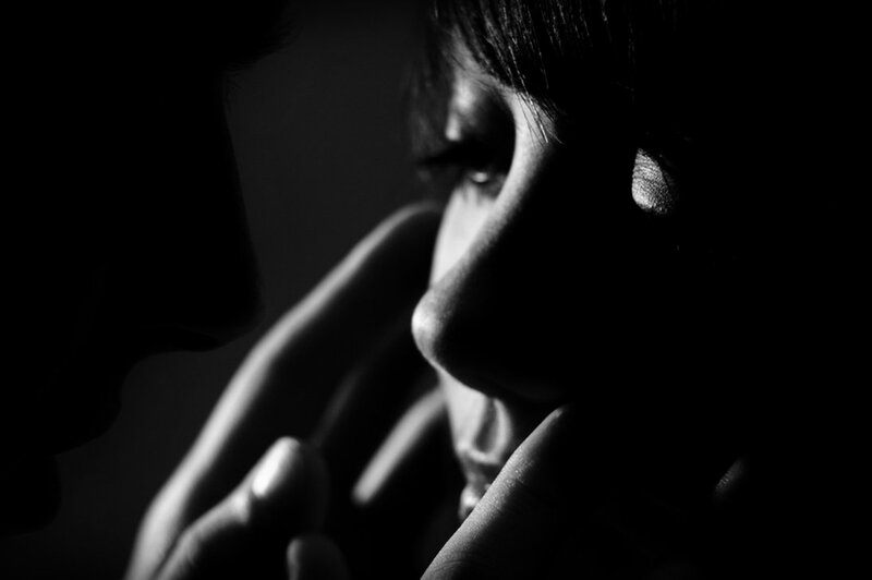 Two People in Silhouette — Black