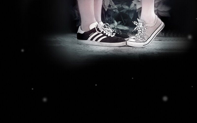 two people in sneakers