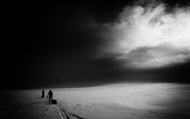 Two People in Snow — Black, Dramatic