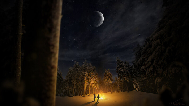 Two People in Snowy Forest