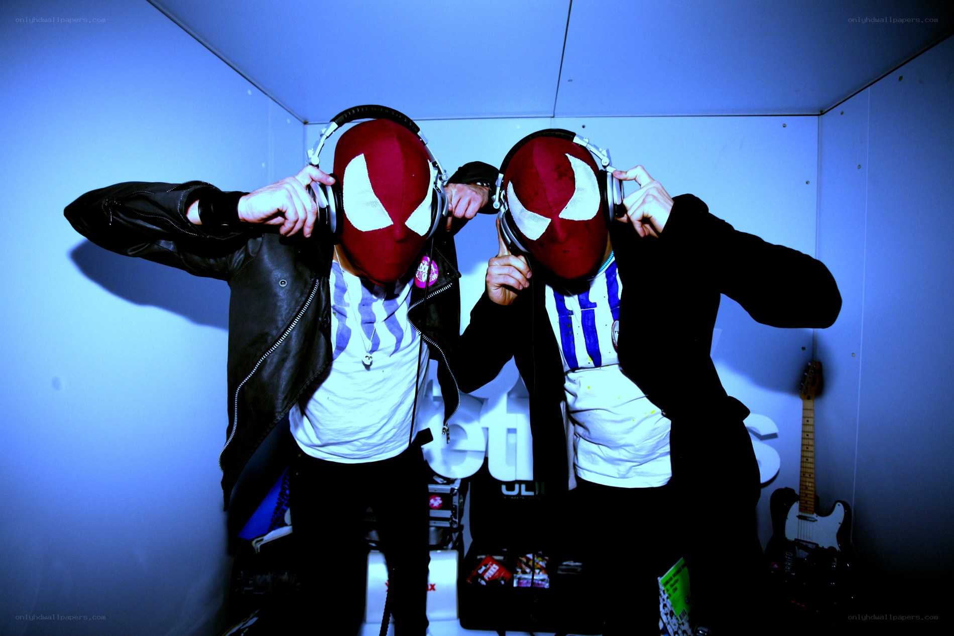 Two people in Spider-Man masks