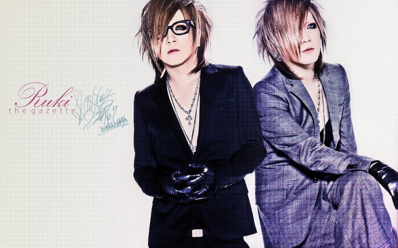 Two People in Suits — Black