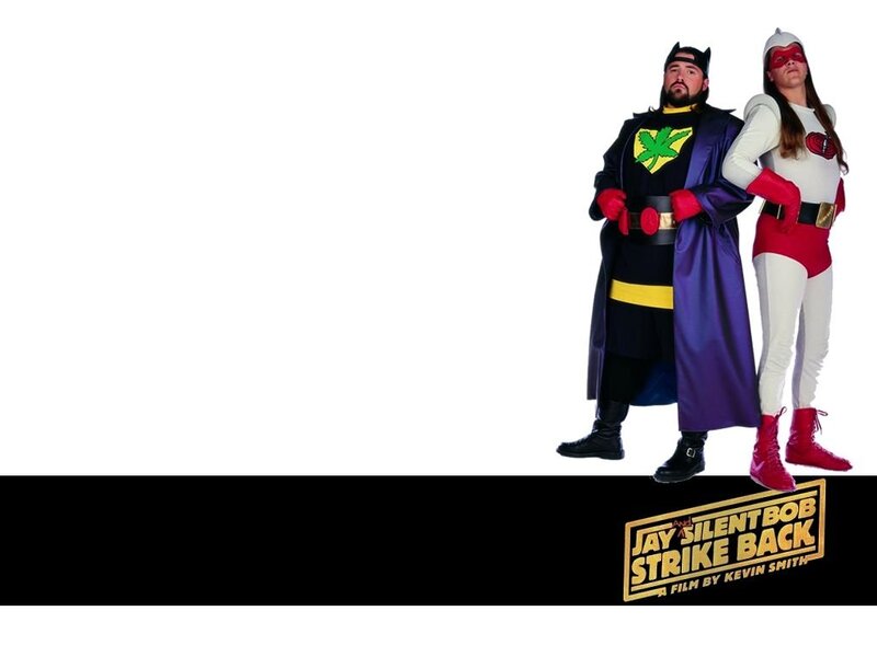 Two People in Superhero Costumes