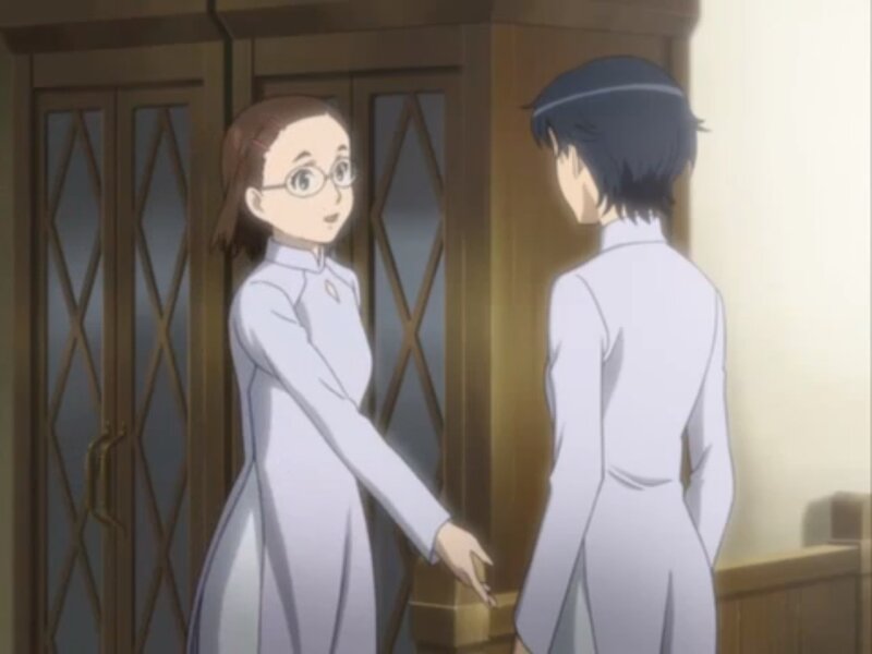Two People in White Uniforms
