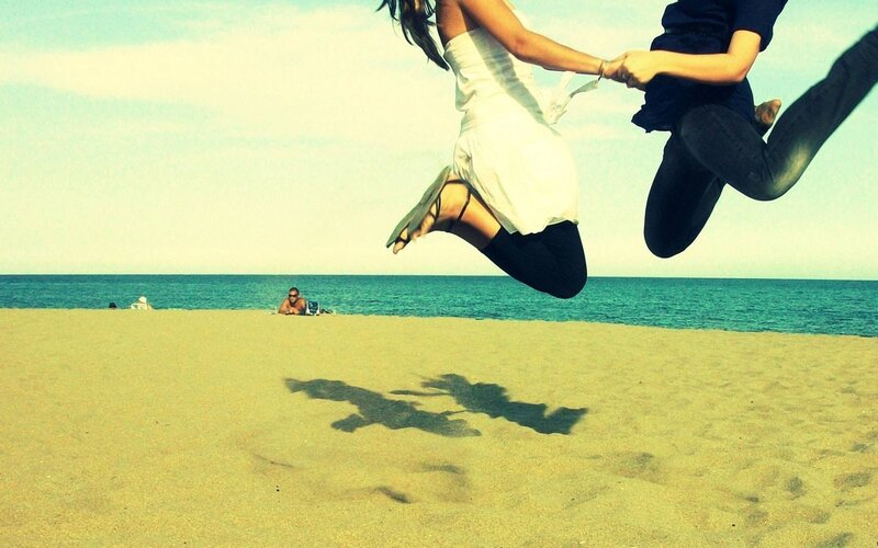 Two People Jumping