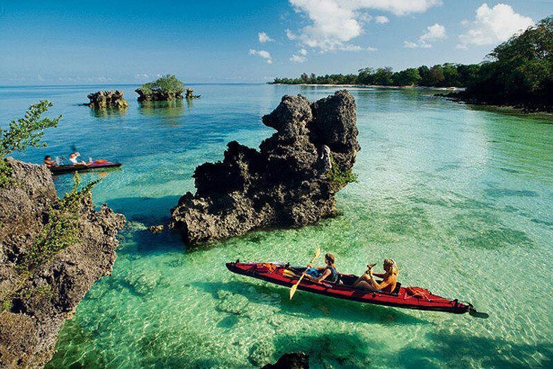 Two People Kayaking — Blue, Serene
