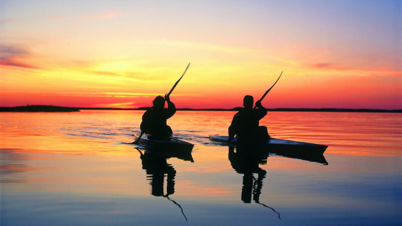 Two People Kayaking — Orange
