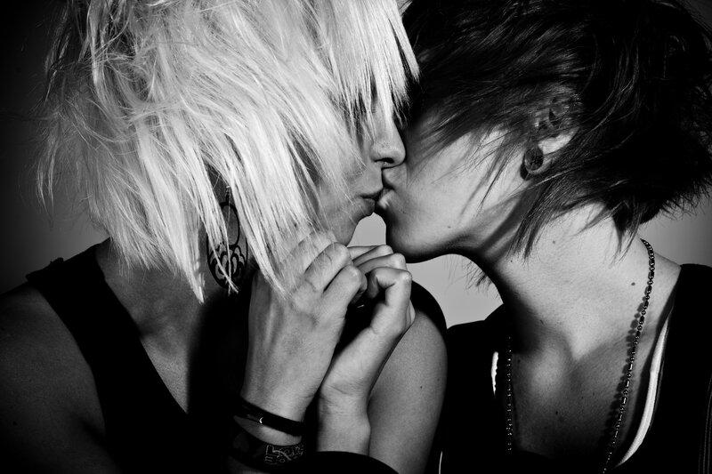 two people kissing in black and white