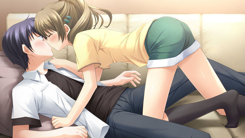 Two People Kissing on a Couch