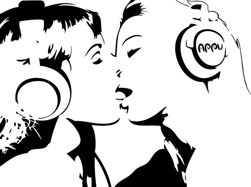 two people kissing with headphones