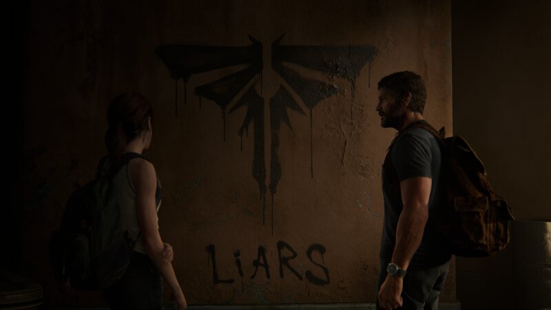 Two People Looking at Graffiti
