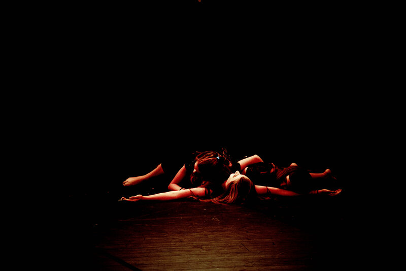 Two People Lying on Floor