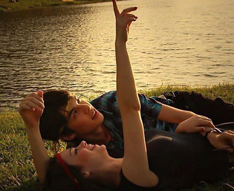Two People Lying on Grass — Green, Serene