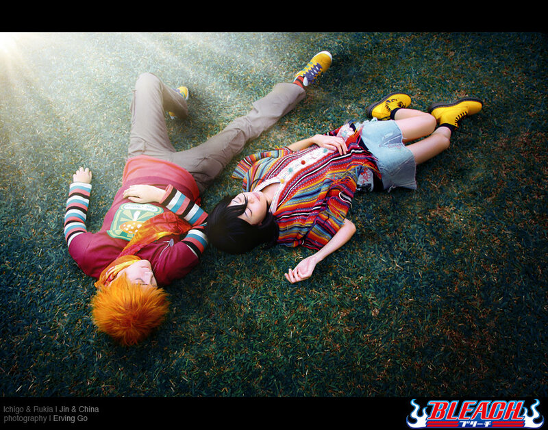 Two People Lying on Grass