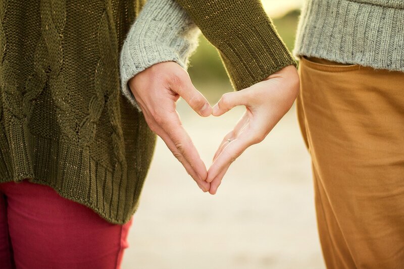 Two People Making Heart Shape — Green