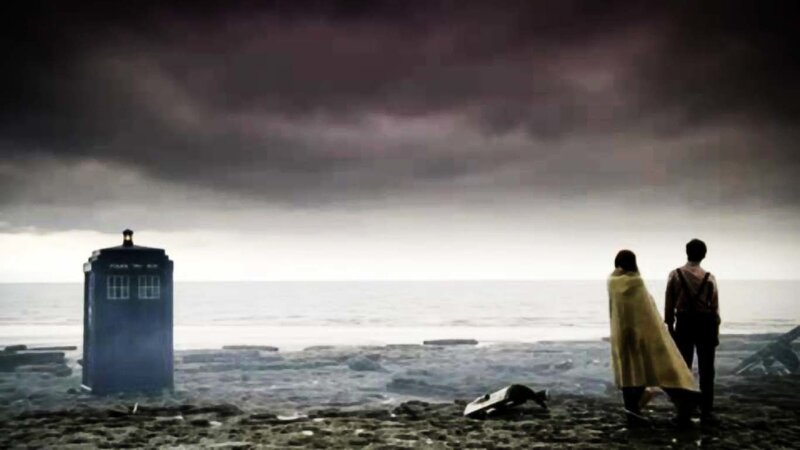 Two People on a Beach — Blue