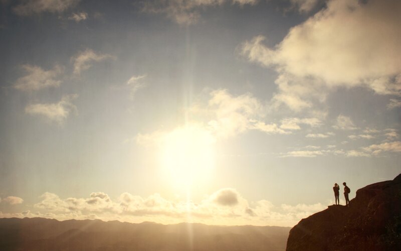 Two People on a Cliff — Blue, Serene, Sunset