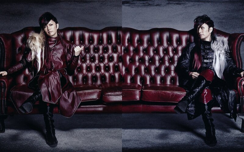 Two People on a Couch — Red