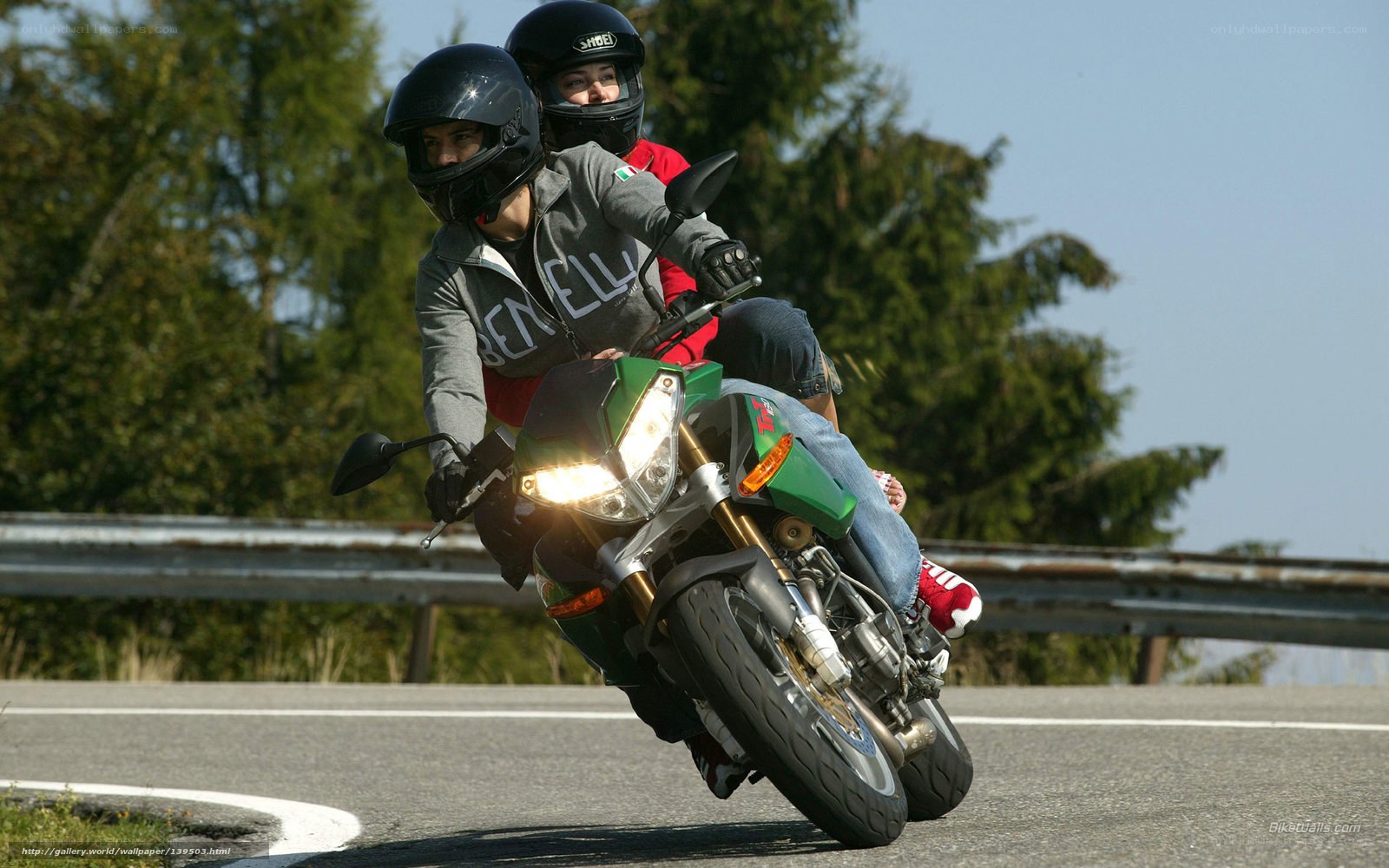 Two people on a motorcycle