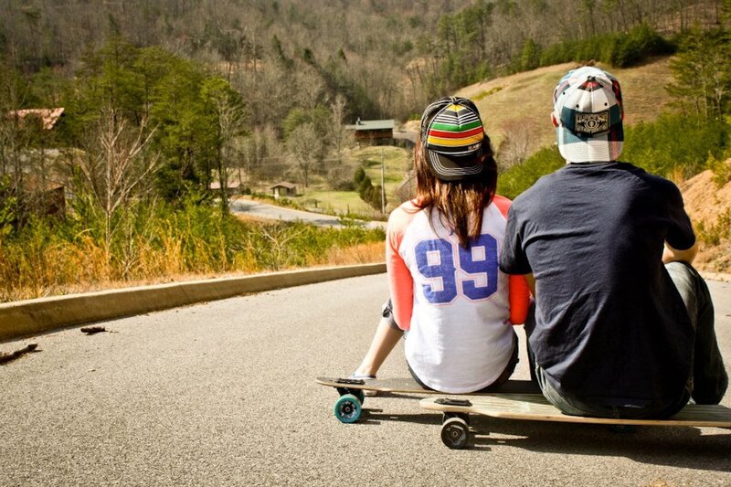 Two People on a Skateboard