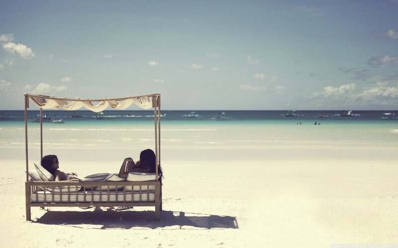 Two People on Beach Bed