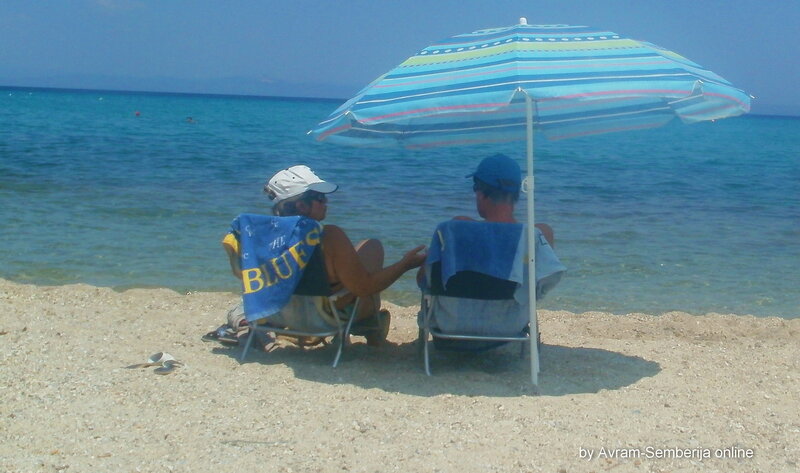 Two People on Beach — Blue, Relaxed