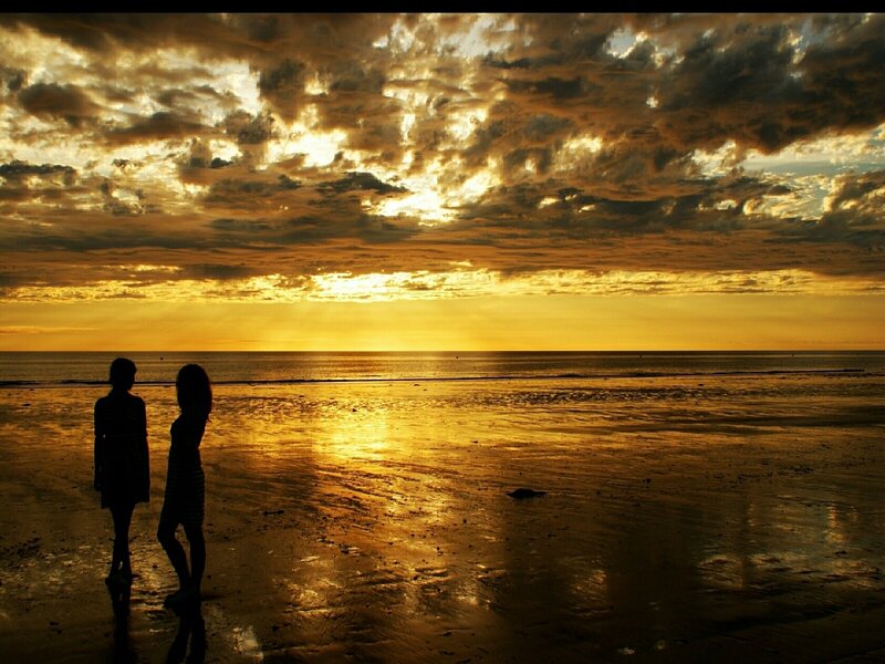 Two People on Beach — Gold, Dramatic, Sunset, Photograph