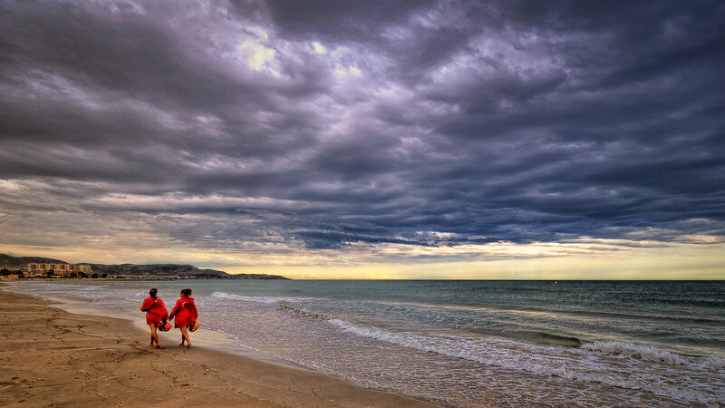 Two People on Beach — Gray, Dramatic, Sunset