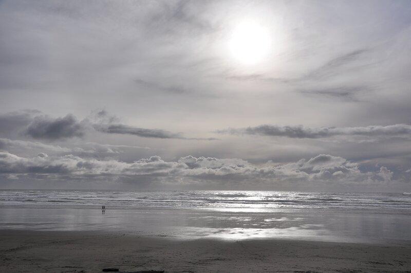 Two People on Beach — Gray, Overcast
