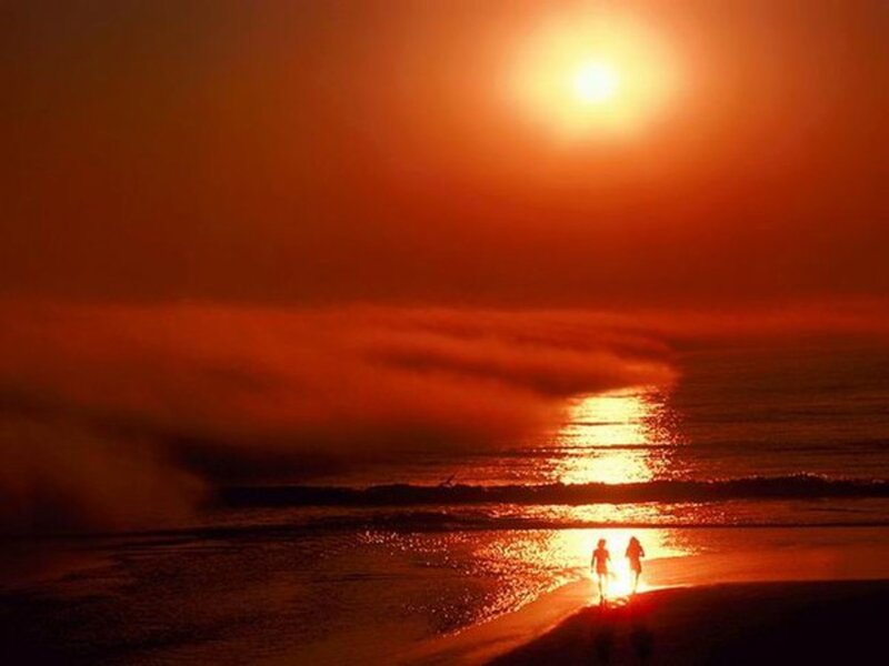 Two People on Beach — Red
